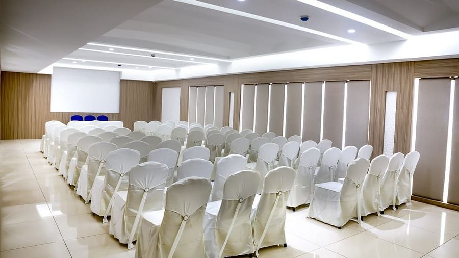 V Square Hall at Mayberry Tiruppur with chairs neatly arranged and good lighting throughout the space